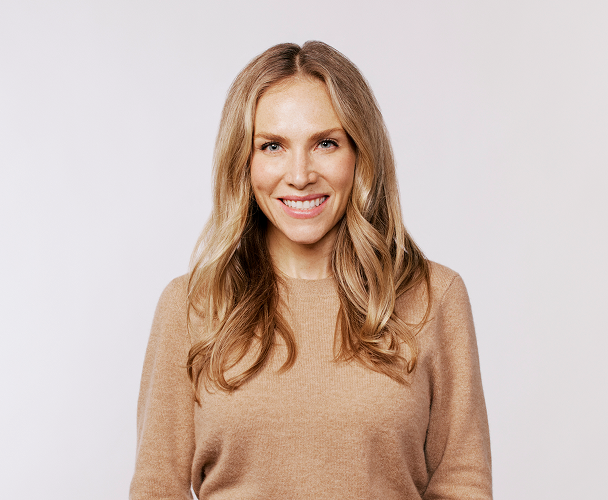 Headshot of Heidi Jonas, General Counsel, wearing a light brown sweater.